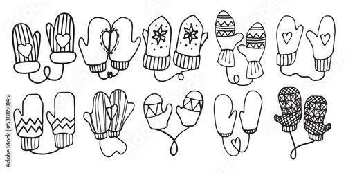 Hand-drawn winter mittens. Doodle elements black on white. Vector illustration