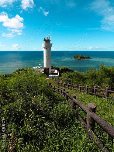Lighthouse at Hirakubo, Ishigaki Island, Okinawa, Japan. In the distance is Daichiri Island. photo
