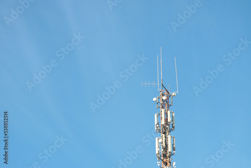 Telecommunication equipment against the blue sky. Modern technologies, 5g, communication.