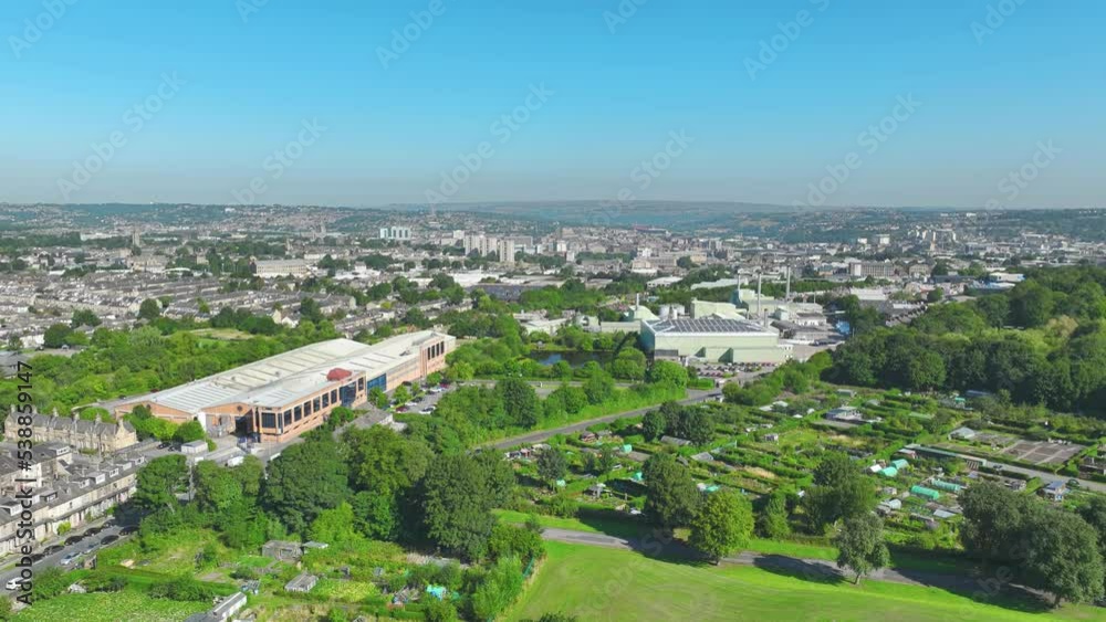 Bradford, UK: Aerial view of city in England, suburb with greenery - landscape panorama of United Kingdom from above Bradford, UK: Aerial view of city in England, suburb with greenery - landscape panorama of United Kingdom from above