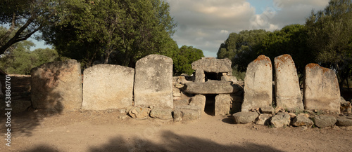 Ruins of nuragic necropolis of Giants Tomb in Monte S'abe near Olbia, Sardinia, Italy photo