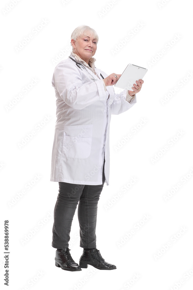 Side view of a mature doctor using a tablet computer - isolated over a white background Side view of a mature doctor using a tablet computer - isolated over a white background