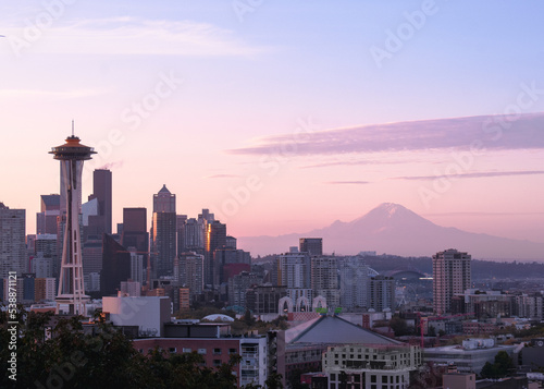 Mount Ranier behind the Seattle city skyline at sunrise photo