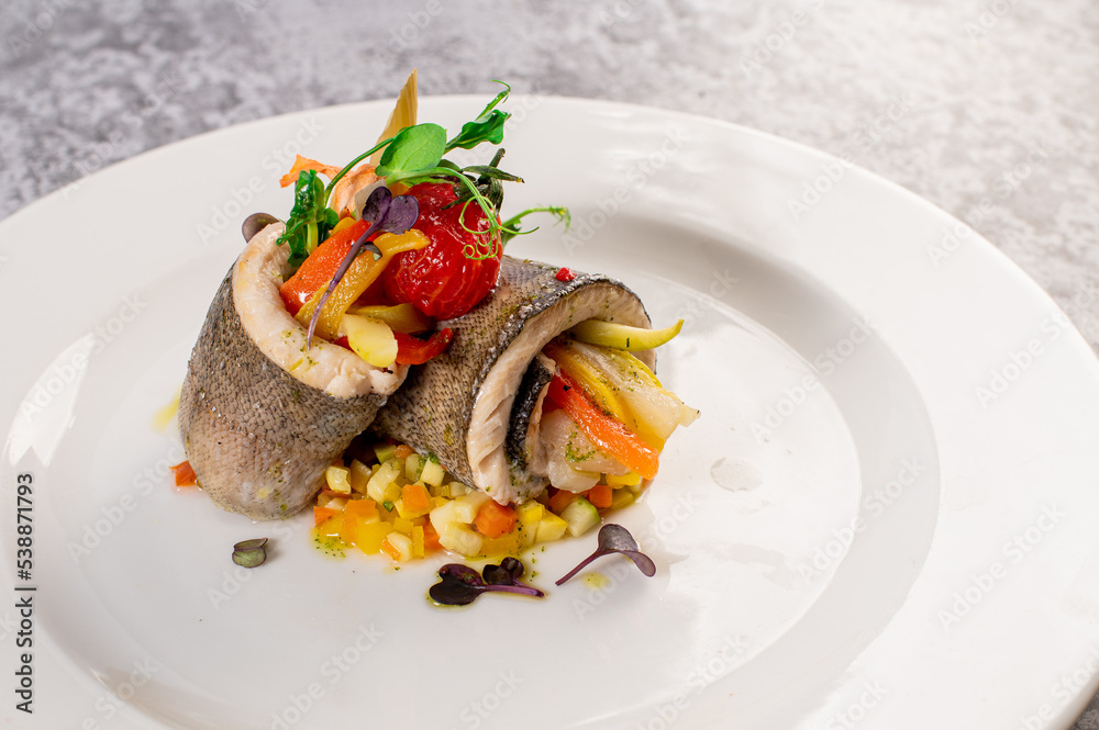 Boiled dorada fish fillet with vegetables. Healthy food. Vegetarian menu. Detox food Boiled dorada fish fillet with vegetables. Healthy food. Vegetarian menu. Detox food