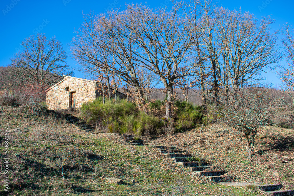 stone hut in the mountains with stone stairway