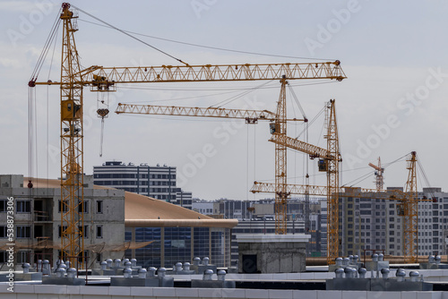 construction cranes in the center of Astana