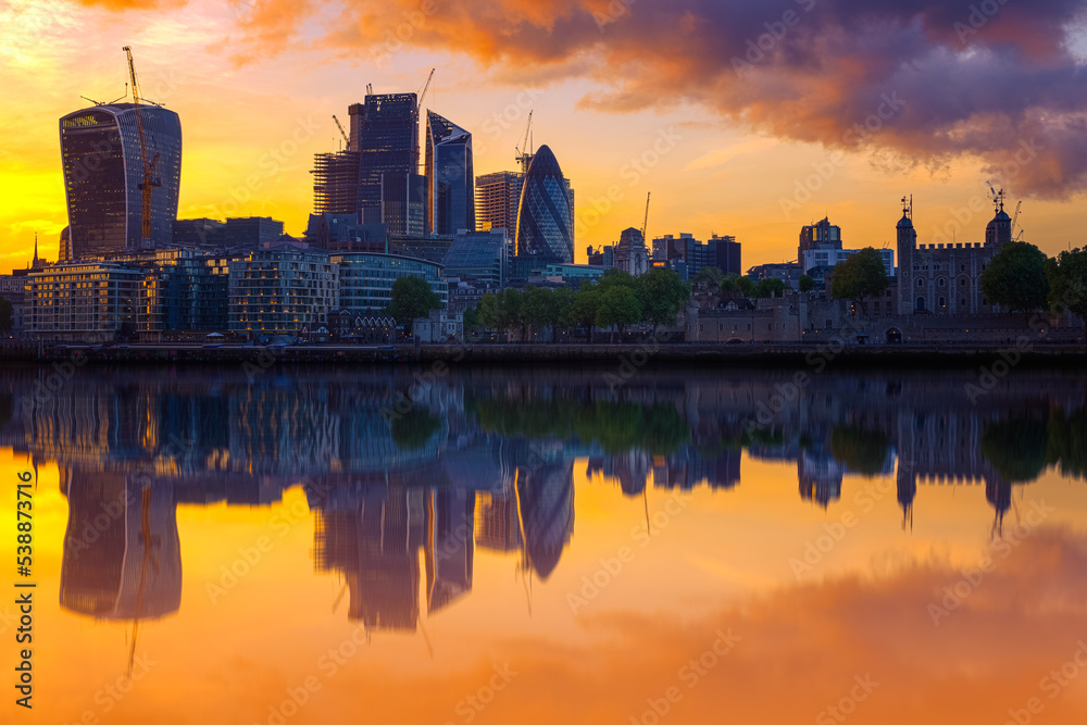 Naklejka premium London cityscape with reflection from river Thames during sunset in England