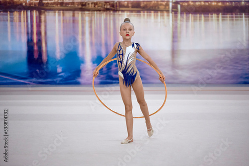 girl competes with a hoop