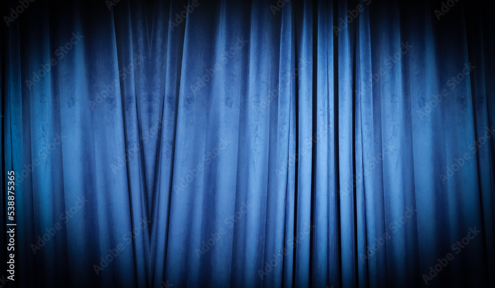 Blue curtain fabric making a dark banner background Blue curtain fabric making a dark banner background