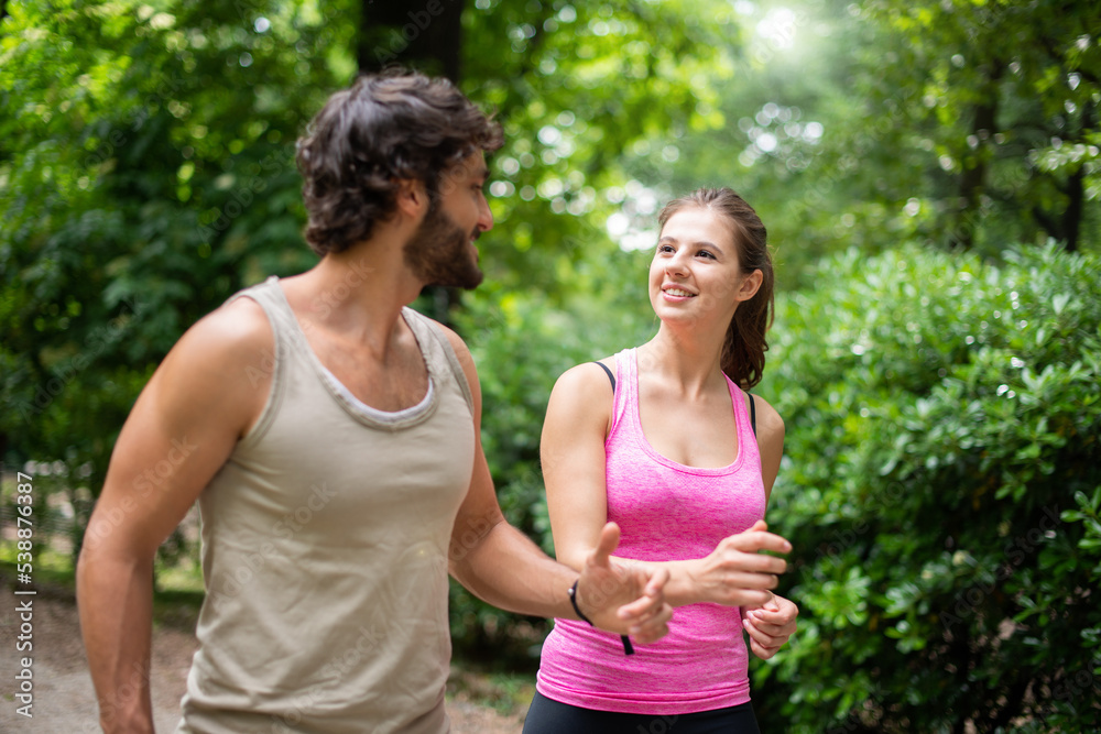Fototapeta premium Couple running together outdoor