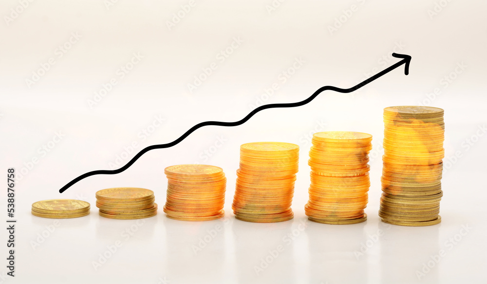 Concept of inflation with fire on coins and trend going upwards Concept of inflation with fire on coins and trend going upwards