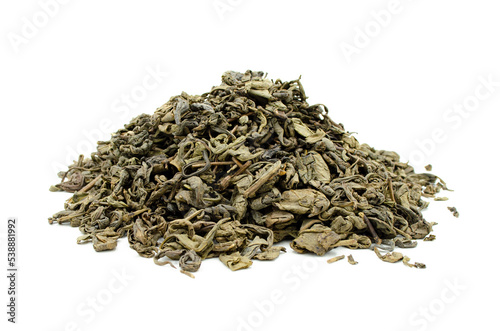 Dry green tea leaves on isolated white background.