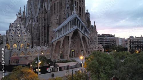 Sunrise drone aerial of the Basilica Sagrada Familia, the iconic church has been in construction for over a century but is scheduled for completion in 2026.