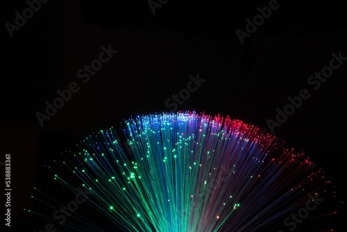 Closeup shot of a color-changing fibre optic lamp in the darkness