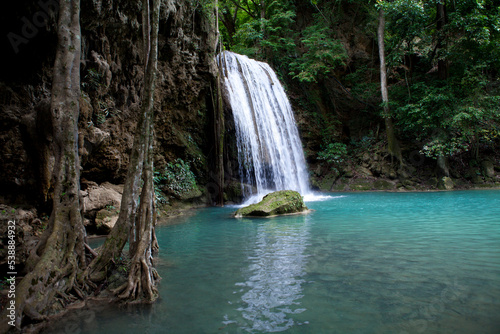 Erawan Waterfall in Kanchanaburi. Amazing turquoise water and wonderful jungle. Ideal place for a picnic and relaxation. One of the most famous tourist attractions in Kanchanaburi province, Thailand. 