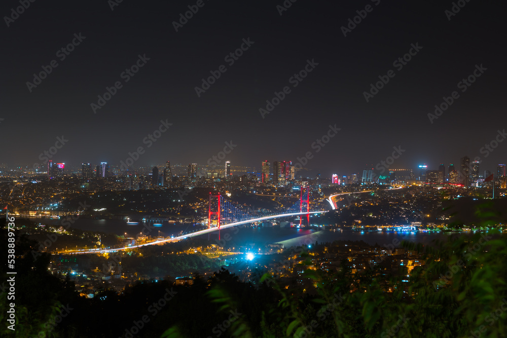 Fototapeta premium Istanbul cityscape. Bosphorus Bridge at night from Camlica Hill