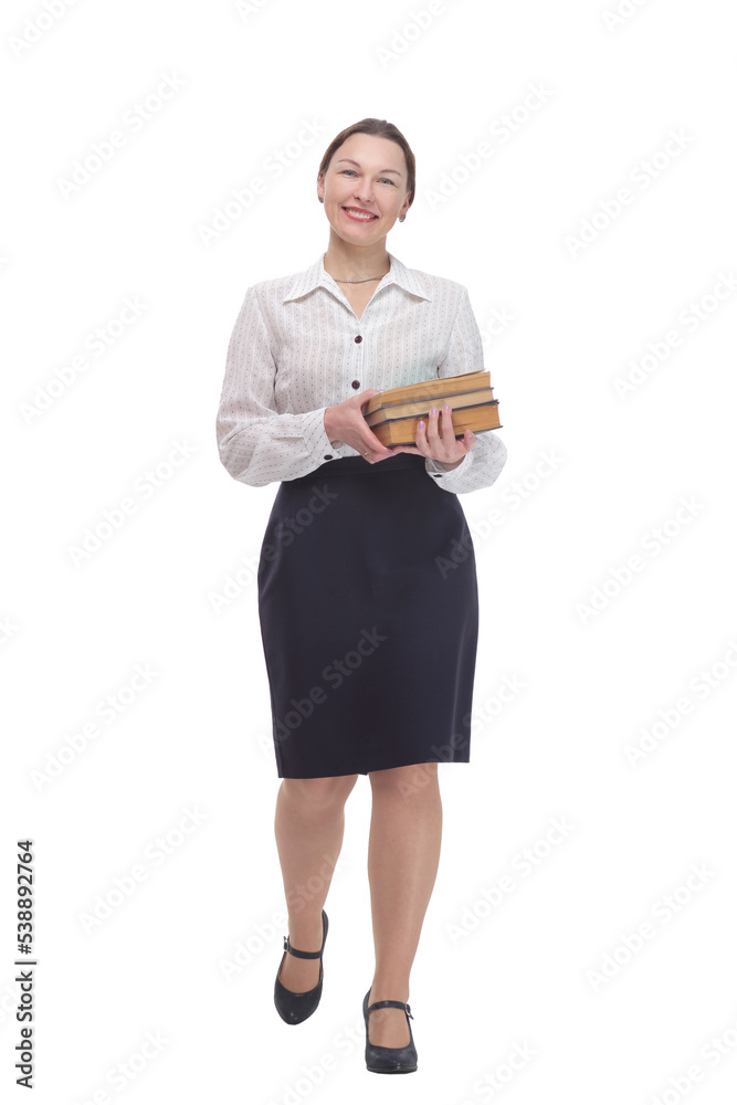 in full growth. businesswoman with a stack of books. in full growth. businesswoman with a stack of books.