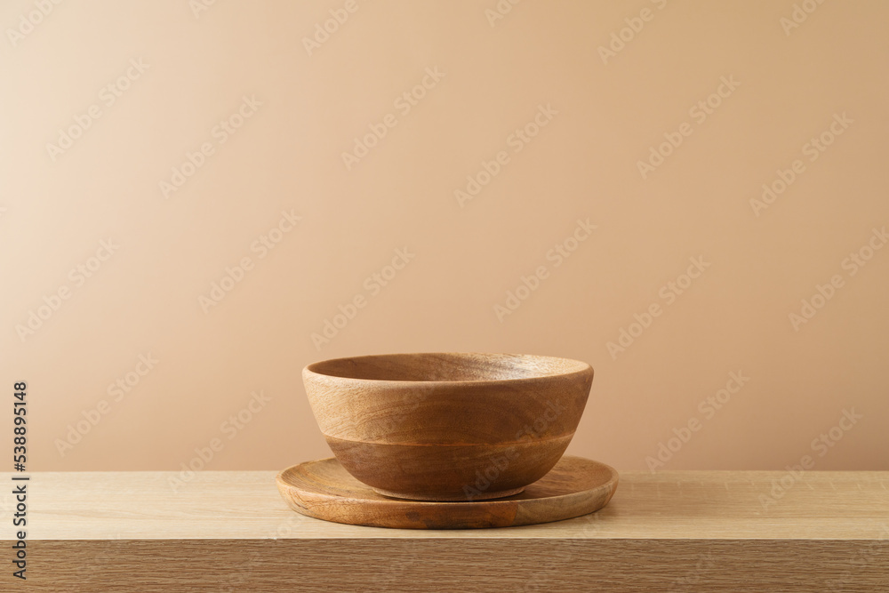 Modern wooden shelf with plate and bowl. Interior mock up for design and product display
