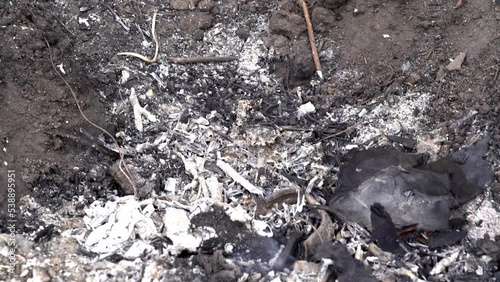 Wallpaper Mural close up of burned pieces of clothing and its decay, ashes after a house fire Torontodigital.ca