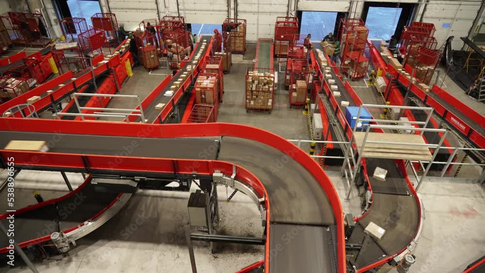 Kyiv, Ukraine - February 2021.
Automated, sorting line of conveyor sorting of parcels. A company that provides express delivery of goods and parcels for individuals and businesses. Logistics center. Kyiv, Ukraine - February 2021.
Automated, sorting line of conveyor sorting of parcels. A company that provides express delivery of goods and parcels for individuals and businesses. Logistics center.