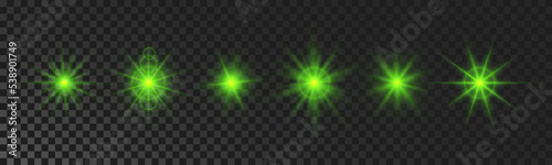 Set of green glowing sparkling stars