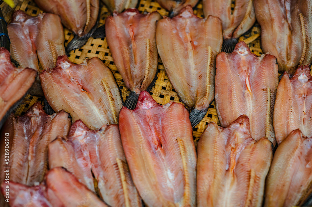 Sun-dried snakehead fish sold along the road in Nakhon Nayok Province, Thailand.