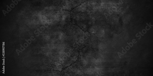 Black stone grunge cracked and black marble wall concrete texture background anthracite panorama. Panorama dark grey black slate background or texture. © MdLothfor