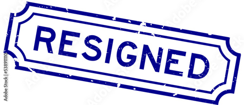 Grunge blue resigned word rubber seal stamp on white background