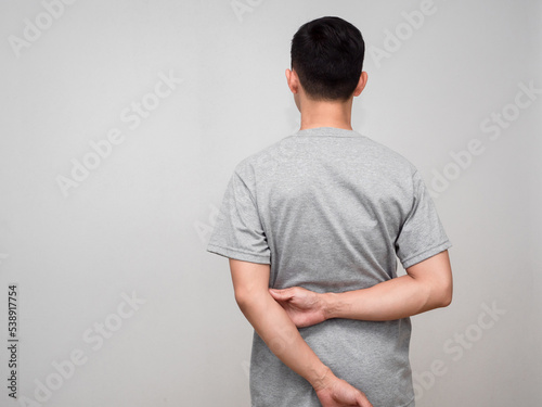 Behind of man grey shirt standing turn back isolated