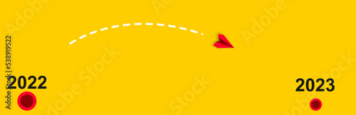The paper plane is moving forward from 2022 to 2023. business creativity new idea discovery innovation technology. new year idea concept