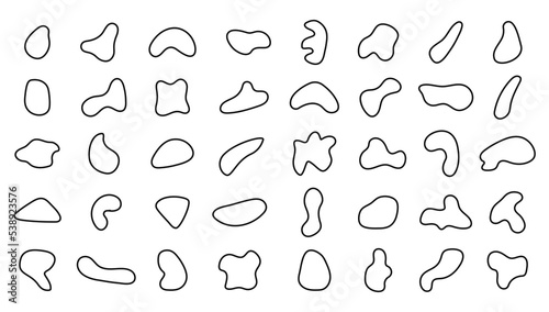 Fototapeta Naklejka Na Ścianę i Meble -  Irregular organic shapes. Abstract outline pebble. Random blobs. Amorphous smooth circles. Black asymmetric stones. Vector