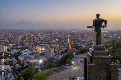 View of Mother Armenia Statue and Yerevan in the night, Armenia.
