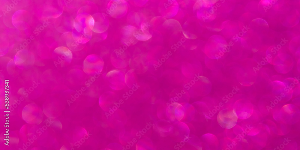 Abstract pink magenta background with unfocused bokeh. Fashionable bright shiny color of femininity, beauty. Festive pure pink layout of a postcard, a New Year banner. Valentine's Day background