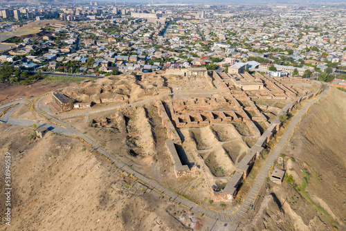 Drone view of Erebuni fortress (founded by Urartian King Argishti I in 782 BC.) on sunny morning. Yerevan, Armenia.