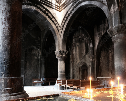 Interior of Katogike Church narthex with candlelight. Geghard monastery, Armenia. photo