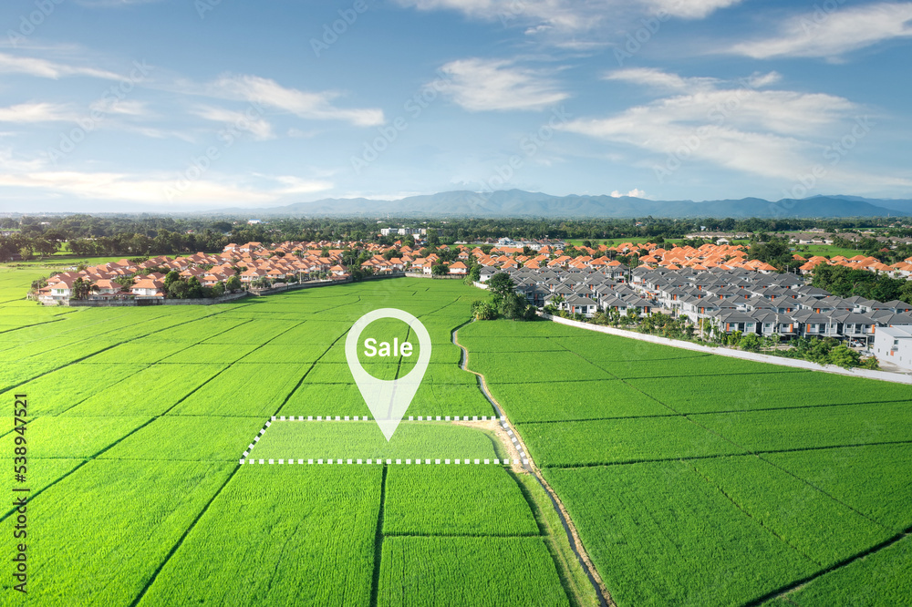 Land plot in aerial view. Real estate or property consist of empty land or green field and gps position pin point of location for development by housing construction, sale, rent, buy or investment.