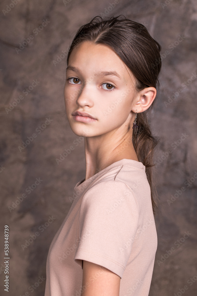 Studio portrait of a young teen girl Studio portrait of a young teen girl