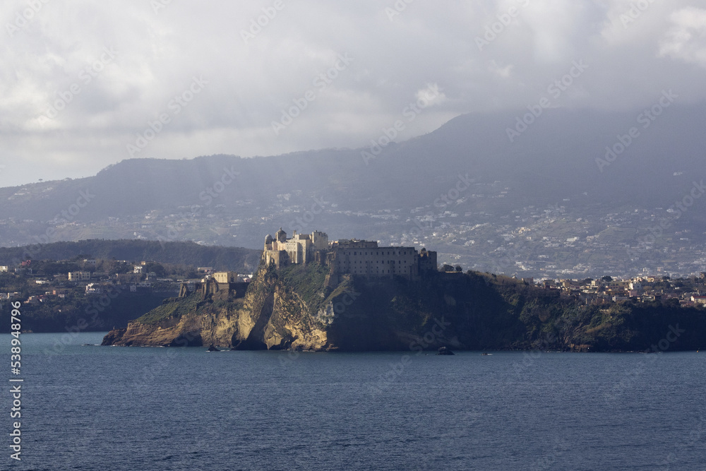Aragonese Castle is a castle next to Ischiaat the northern end of the Gulf of Naples, Italy Europe. Beautiful tourist destination for summer and Christmas holidays. Italian beauties