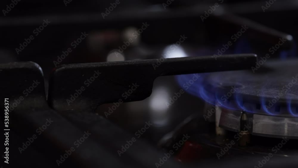 Gas Stove Ignition Closeup View. Kitchen Gas Stove Burner Fire Lights