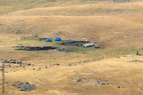 View of summer camp of shepherds (probably Yazidis) on Aragats Mount slope. Aragats, Armenia. photo