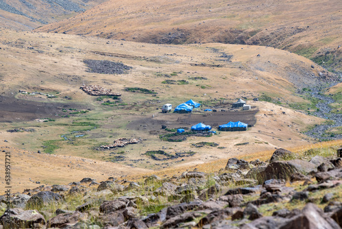 View of summer camp of shepherds (probably Yazidis) on Aragats Mount slope. Aragats, Armenia. photo