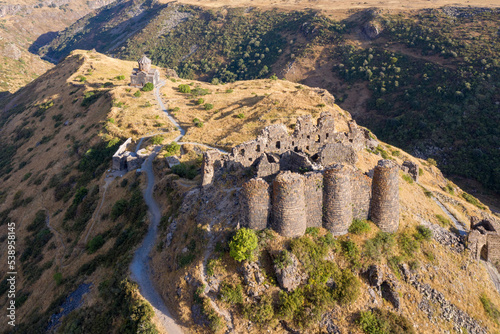 View of Amberd fortress on Mount Aragats slope on sunny summer evening. Aragatsotn Province, Armenia. photo