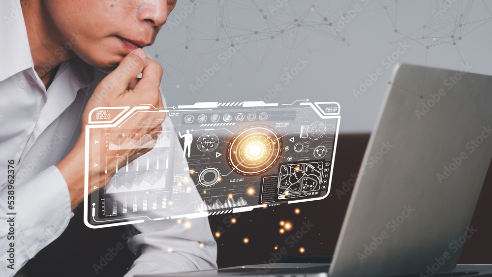 Analyst working with computer in Business Analytics and Data Management ...