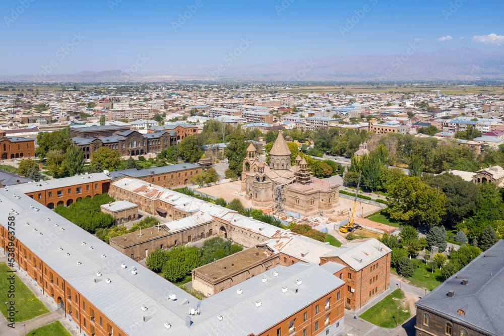 Aerial view of Etchmiadzin Cathedral under reconstruction on summer sunny day. Vagharshapat, Armenia.