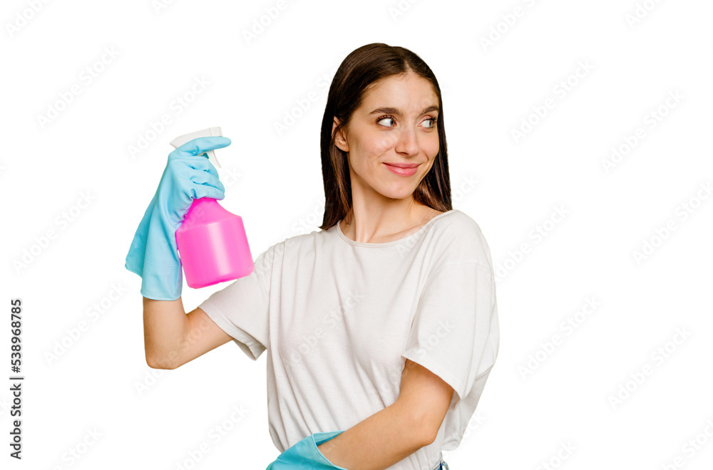 Young cleaner woman isolated looks aside smiling, cheerful and pleasant. Young cleaner woman isolated looks aside smiling, cheerful and pleasant.