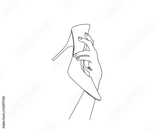 Continuous one line drawing of hand holding elegant highheels shoes Women stiletto heel line art drawing vector design.