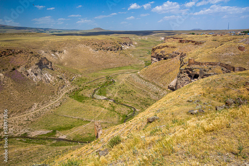 Tsaghkotsadzor (Alaca cay) valley with man-made caves next to the ancient city Ani, Turkey