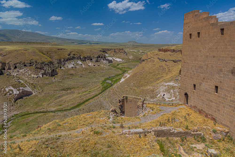 Tsaghkotsadzor (Alaca cay) valley with man-made caves next to the palace of ancient city Ani, Turkey
