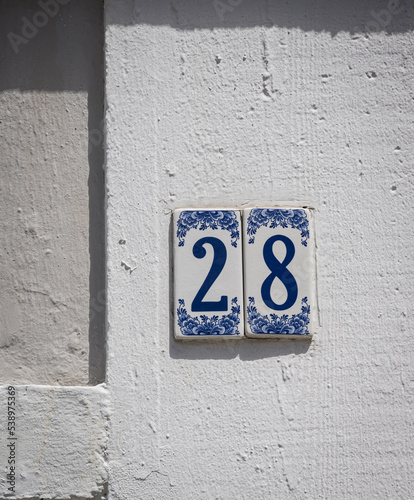 Decorative tiled house number in the town of Philipsburg, Dutch Caribbean island of Sint Maarten