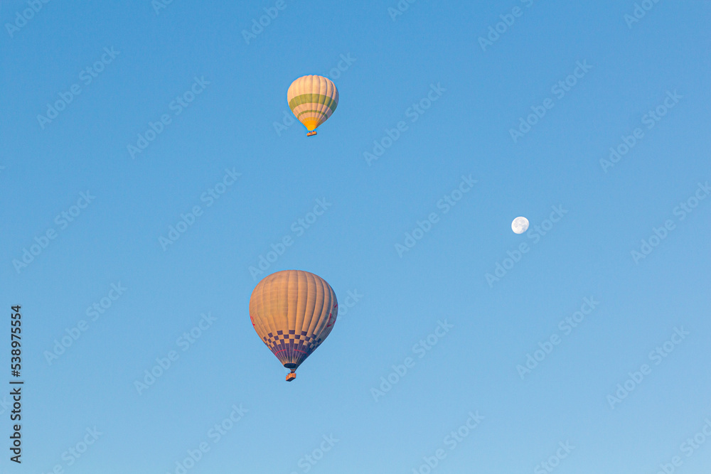 Fototapeta premium Hot air balloons and a moon